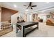 Finished basement includes ping pong table and leads to a living space at 95 Nesbit Reserve Ct, Alpharetta, GA 30022
