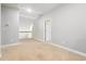 Versatile bonus room space with neutral carpet, fresh paint, and a bright, open layout, ready for customization at 95 Nesbit Reserve Ct, Alpharetta, GA 30022