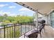 Enjoy this condo's balcony with seating, grill, and fountain view overlooking beautiful green trees at 3101 Howell Mill Nw Rd # 301, Atlanta, GA 30327