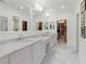 Bathroom featuring double vanity, marble countertops, vanity, and a spacious walk-in closet at 3101 Howell Mill Nw Rd # 301, Atlanta, GA 30327