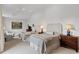 Bedroom featuring two beds, seating area, soft lighting, and calming, neutral color palette at 3101 Howell Mill Nw Rd # 301, Atlanta, GA 30327