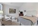 Bedroom featuring soft lighting, a comfortable seating area, and calm neutral decor at 3101 Howell Mill Nw Rd # 301, Atlanta, GA 30327