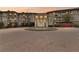 Luxury building featuring a beautiful fountain, landscaped grounds, and a circular brick driveway at 3101 Howell Mill Nw Rd # 301, Atlanta, GA 30327