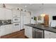 Gourmet kitchen with stainless steel appliances, granite countertop and hardwood floors at 3101 Howell Mill Nw Rd # 301, Atlanta, GA 30327