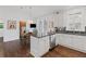 Kitchen and dining area features stainless steel appliances, granite countertop and hardwood floors at 3101 Howell Mill Nw Rd # 301, Atlanta, GA 30327