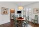 Kitchen and breakfast area features hardwood floors and access to the laundry room at 3101 Howell Mill Nw Rd # 301, Atlanta, GA 30327