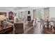 Spacious living room with a fireplace, hardwood flooring, and natural light at 3101 Howell Mill Nw Rd # 301, Atlanta, GA 30327