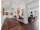 Bright living room with hardwood floors and neutral decor open to a large gallery at 3101 Howell Mill Nw Rd # 301, Atlanta, GA 30327
