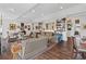 Spacious living room featuring custom bookshelves, hardwood floors, and comfortable seating at 3101 Howell Mill Nw Rd # 301, Atlanta, GA 30327