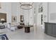 A grand lobby with high ceilings, elegant lighting, and a sophisticated seating area creates a luxurious ambiance at 3101 Howell Mill Nw Rd # 301, Atlanta, GA 30327