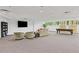 Spacious recreation room featuring comfortable seating, TV, and pool table at 3101 Howell Mill Nw Rd # 301, Atlanta, GA 30327