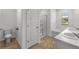 This bathroom offers a dual sink, tub, separate shower, and a private toilet area at 3736 Chevington Se Ct, Atlanta, GA 30354