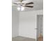 A cozy bedroom with a ceiling fan and neutral walls offers a relaxing atmosphere at 3736 Chevington Se Ct, Atlanta, GA 30354