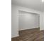 Open doorway showcasing beautiful hard surface floors and neutral paint throughout the house at 3736 Chevington Se Ct, Atlanta, GA 30354