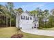 Charming two-story home with a well-manicured lawn, a two-car garage, and inviting curb appeal at 3736 Chevington Se Ct, Atlanta, GA 30354