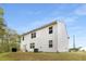 Two-story home with a large backyard, featuring a patio, perfect for outdoor gatherings and relaxation at 3736 Chevington Se Ct, Atlanta, GA 30354