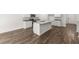 Modern kitchen with stainless steel appliances, granite countertops, and an island with a sink at 3736 Chevington Se Ct, Atlanta, GA 30354
