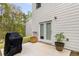 Cozy patio with double doors, offering an ideal spot for relaxation and enjoying the serene outdoor space at 3736 Chevington Se Ct, Atlanta, GA 30354