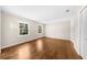Bedroom featuring hardwood flooring, natural light, and a closet at 5145 Davantry Dr, Dunwoody, GA 30338