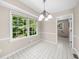 Cozy breakfast nook with large windows and tiled flooring at 5145 Davantry Dr, Dunwoody, GA 30338