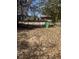 Exterior back view showing yard with potential, featuring a small home ready for renovation at 5168 Ellen St, Forest Park, GA 30297