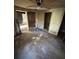 A bedroom with adjacent spaces shows potential for renovation and new design concepts at 5168 Ellen St, Forest Park, GA 30297