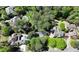 Aerial view of a residential neighborhood with tree-lined streets, pools, and well-maintained homes at 671 Valley Green Ne Dr, Atlanta, GA 30342
