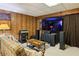 Finished basement featuring a home theater setup and comfortable seating area at 671 Valley Green Ne Dr, Atlanta, GA 30342