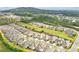 A picturesque aerial view of the neighborhood showcasing a well-planned community with lush greenery at 807 Bridget Sw Walk, Powder Springs, GA 30127