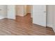Bedroom featuring beautiful wood flooring and doors leading to other rooms at 807 Bridget Sw Walk, Powder Springs, GA 30127