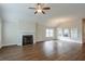 Spacious living room with vaulted ceiling, fireplace, and plenty of natural light at 807 Bridget Sw Walk, Powder Springs, GA 30127