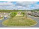 Beautiful street featuring sidewalks and lush green spaces offering a park-like setting in the neighborhood at 807 Bridget Sw Walk, Powder Springs, GA 30127
