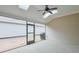 Relaxing screened porch with high ceilings, skylights, and a ceiling fan to enjoy bug-free outdoor living at 807 Bridget Sw Walk, Powder Springs, GA 30127