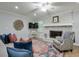Comfortable living room with a fireplace, plush seating, and stylish decor at 1590 Arden Sw Dr, Marietta, GA 30008