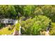 A high angle view showcases the property with a sprawling, tree-filled lot in a serene, lush setting at 2685 Hearthstone Cir, Marietta, GA 30062