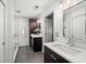 Elegant bathroom featuring a glass shower, dual marble vanity, and modern fixtures at 2685 Hearthstone Cir, Marietta, GA 30062