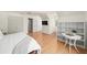 Spacious bedroom featuring hardwood floors, white walls, and built-in shelving at 2685 Hearthstone Cir, Marietta, GA 30062