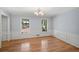Charming dining room with elegant paneling, hardwood floors, and natural light at 2685 Hearthstone Cir, Marietta, GA 30062