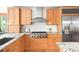 Modern kitchen featuring stainless steel appliances, granite countertops, and stylish wood cabinetry at 2685 Hearthstone Cir, Marietta, GA 30062