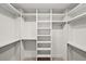 Spacious walk-in closet with custom shelving and plenty of hanging space at 2685 Hearthstone Cir, Marietta, GA 30062