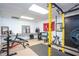 Finished basement with home gym equipment and ample workout space at 393 Westminister Sw Ln, Lilburn, GA 30047