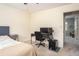 Neutral bedroom with a desk setup, perfect for work or gaming at 393 Westminister Sw Ln, Lilburn, GA 30047