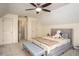 Spacious bedroom featuring a cozy bed and ample closet space at 393 Westminister Sw Ln, Lilburn, GA 30047