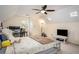 Comfortable bedroom with natural light and space for a home office area at 393 Westminister Sw Ln, Lilburn, GA 30047