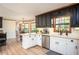 Bright and modern kitchen with stainless steel appliances and ample countertop space at 393 Westminister Sw Ln, Lilburn, GA 30047