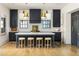 Kitchen with a marble island, counter seating, and designer pendant lighting at 77 Delmont Ne Dr, Atlanta, GA 30305