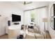 Elegant home office with large window, modern furniture, and stylish decor at 77 Delmont Ne Dr, Atlanta, GA 30305