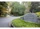Historic Garden Hills sign with landscaping, streets, and trees in the background at 77 Delmont Ne Dr, Atlanta, GA 30305