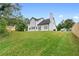 Expansive backyard with lush green grass, perfect for outdoor activities and relaxation at 1125 Reunion Pl, Atlanta, GA 30331