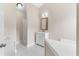 Bathroom with double vanity, bright tile, and plenty of counter space at 1125 Reunion Pl, Atlanta, GA 30331